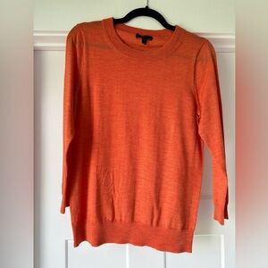 Orange knit sweater